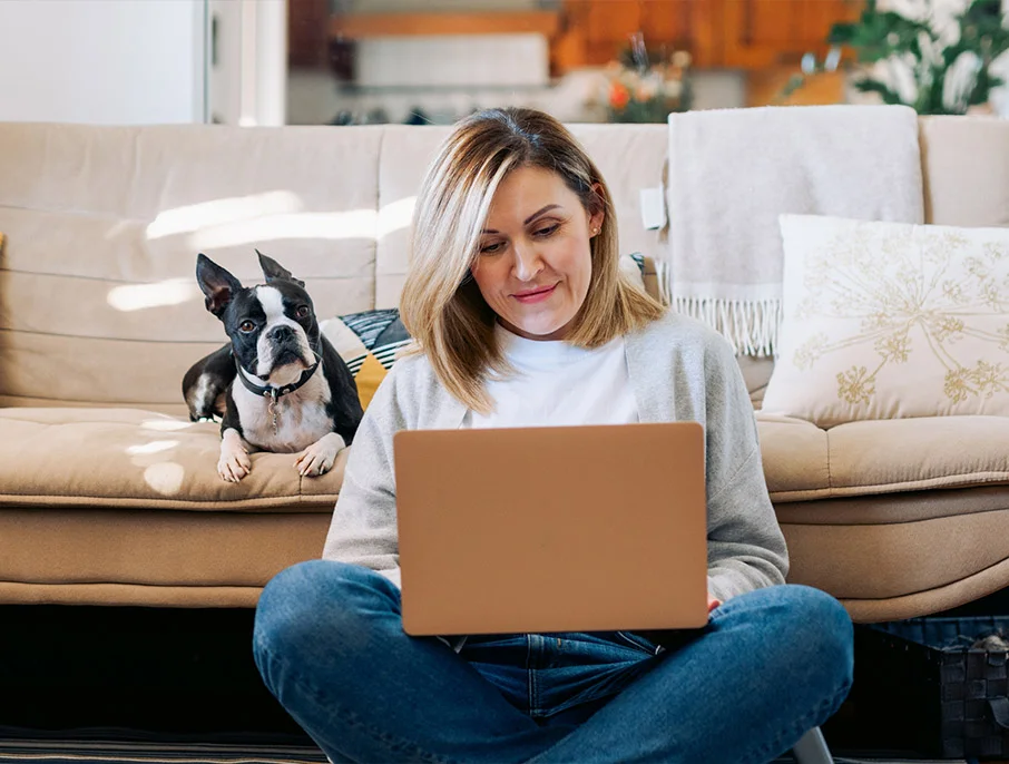 A woman sitting with laptop